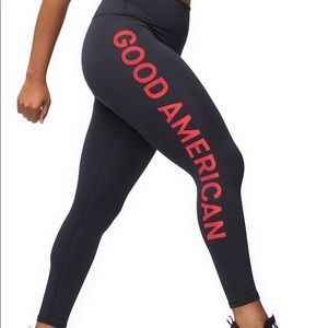 Good American black leggings with red logo